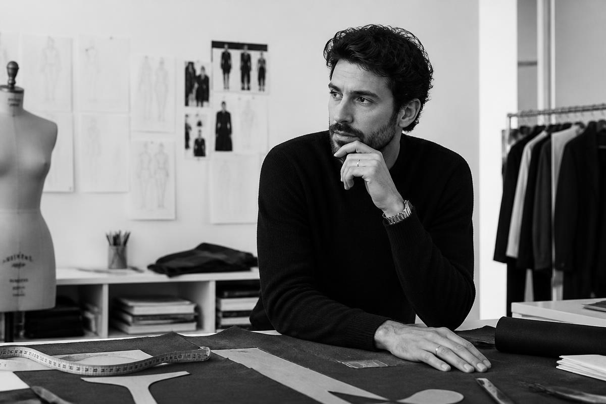 Male fashion designer at work in a minimalist atelier